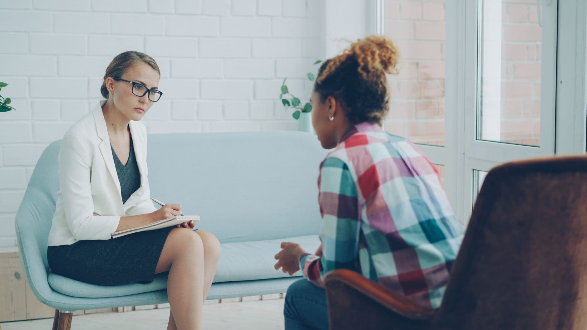 Therapist listening during a private counseling session